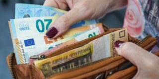 Работающих в Литве и Великобритании белорусов ждет двойной налог