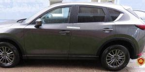 Пьяный гродненец сбросил бутылку на припаркованную во дворе "Мазду". Во сколько эксперты оценили ущерб?